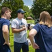 Future Sailors and their recruiters participate in a Family Day event.