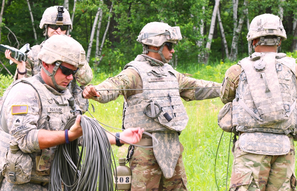 Engineers preparing detonation cord for an exercise.