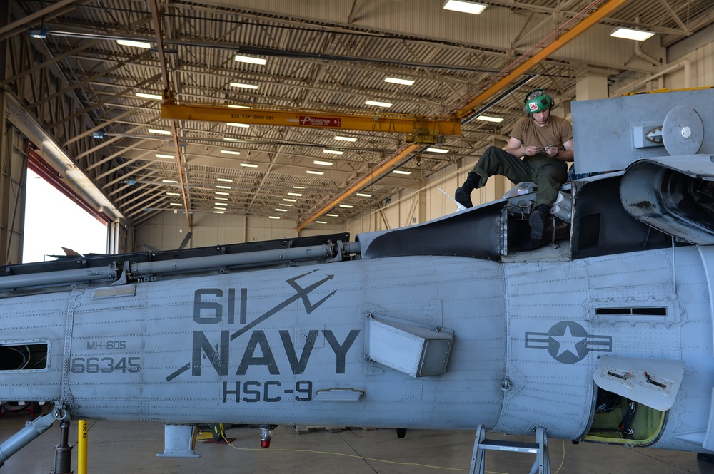 Performing Maintenance on MH-60S Seahawk