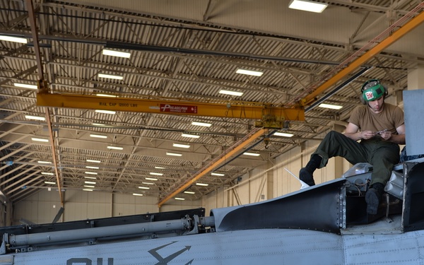 Performing Maintenance on MH-60S Seahawk