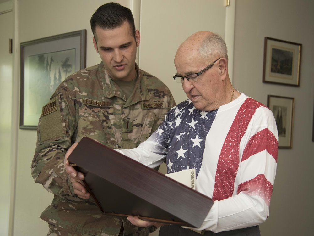 JBSA presents flag to World War II POW, former Schertz mayor