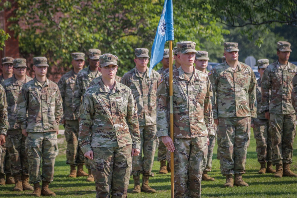 Capt. Heather Jebb presents her company to Maj. Gen. Brian J. McKiernan