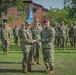 Maj. Gen. Brian J. McKiernan presents Brig. Gen. Roy M. Strom award to Capt. Heather Jebb