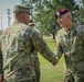 Maj. Gen. Brian J. McKiernan congratulates 1st Sgt. Aaron Shrock