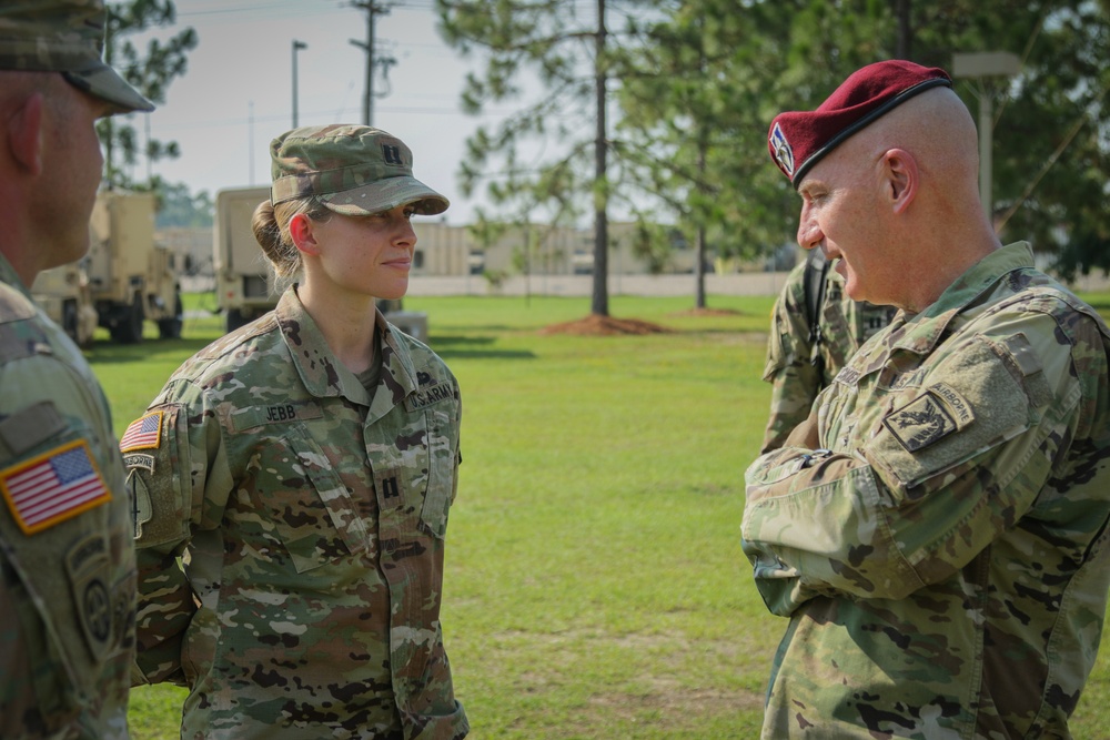 Maj. Gen. Brian J. McKiernan speaks with Capt. Heather Jebb