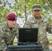 Spc. Gerome Cagaoan conducts equipment demonstration for Maj. Gen. Brian J. McKiernan