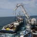 Coast Guard response crews recover more than 450,000 gallons of lubricant and heavy fuel oils from the Coimbra shipwreck