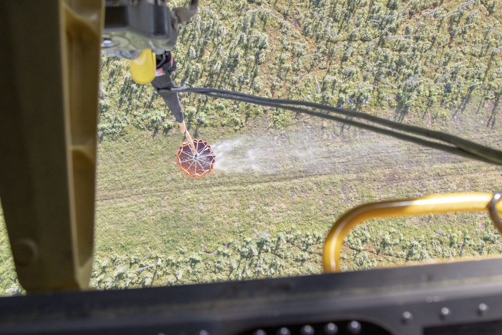 CH-47 Chinook helicopter practices water bucket drops