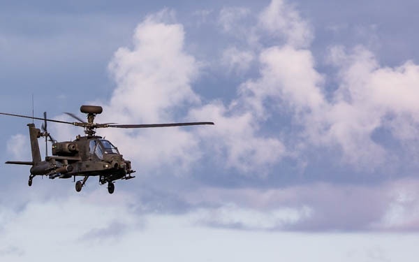 U.S. and U.K. Soldiers observe Apache live fire in Poland