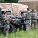 IANG Infantry Soldiers Apply Face Paint at XCTC