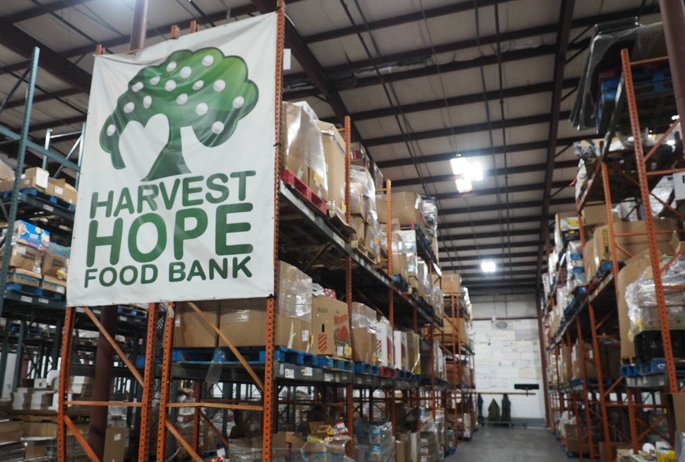 Summer student volunteers give service to local food bank