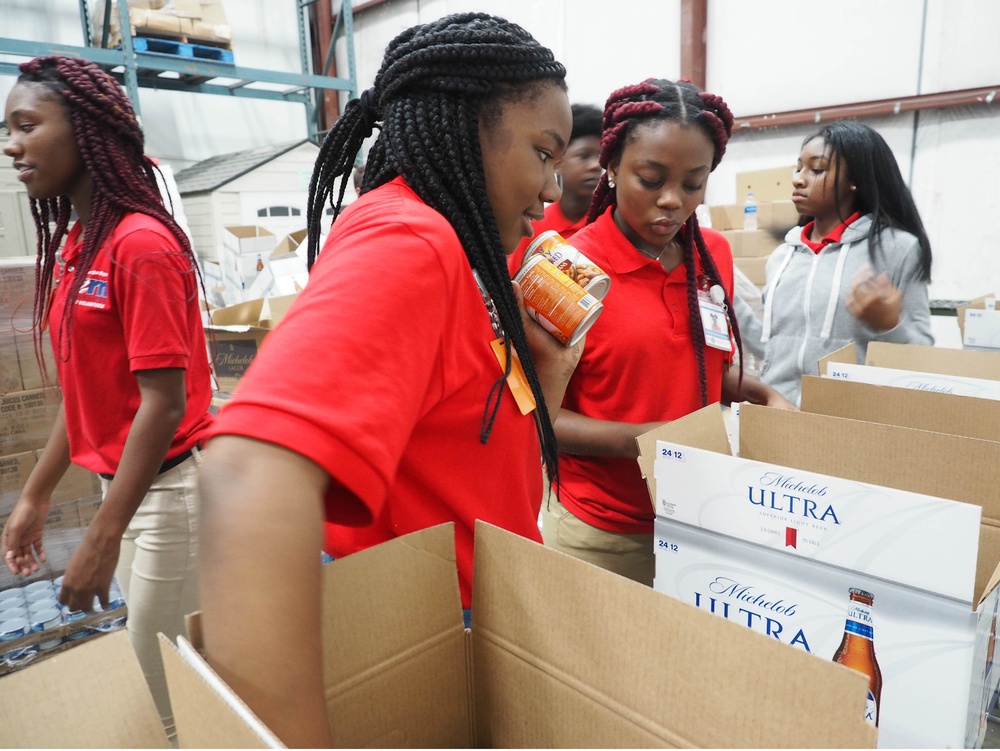 Summer student volunteers give service to local food bank