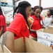 Summer student volunteers give service to local food bank