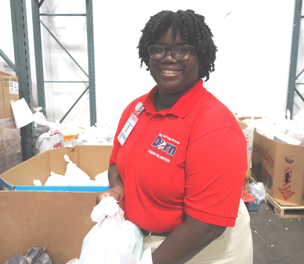 Summer student volunteers give service to local food bank