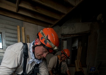 Firefighters perform collapsed structure training
