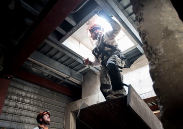 Firefighters perform collapsed structure training