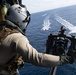 Naval Air Crewman Flies in MH-60S Helicopter