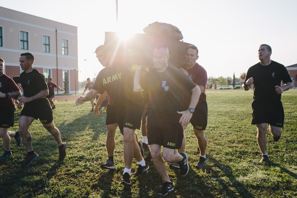 Jumpmasters carry door bundles during PT