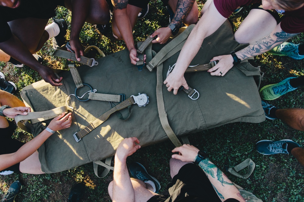 Jumpmasters rig door bundles during PT