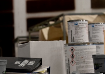 Airmen give F-16s new paint job