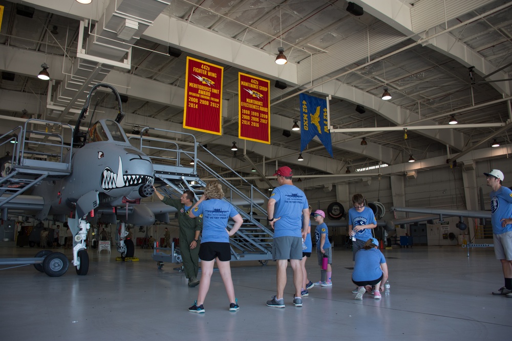 303 FS teams up with Sporting KC, gives families 'fighter pilot for the day' experience