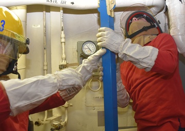 CGC Bertholf crew drills on damage control during Western Pacific patrol