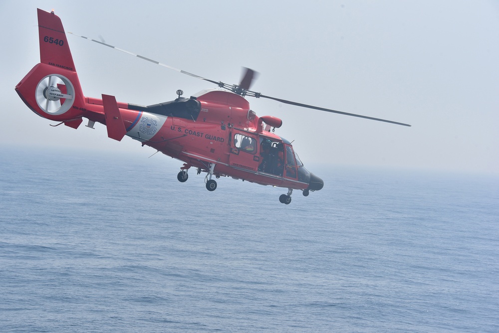 CGC Bertholf conducts flight operations over the Yellow Sea