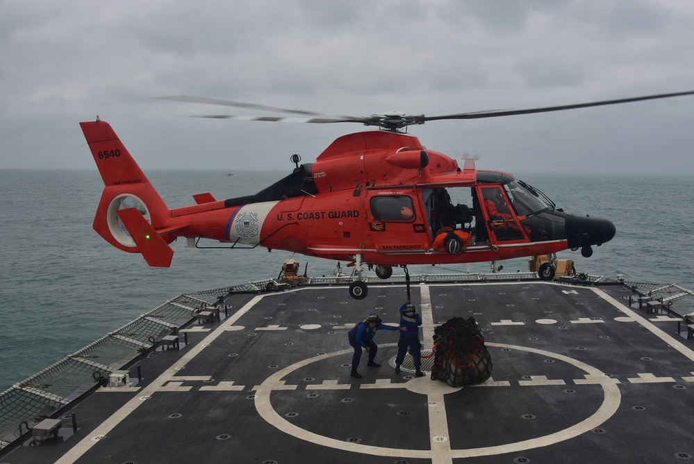 Crewmembers train for vertical replenishment aboard CGC Bertholf