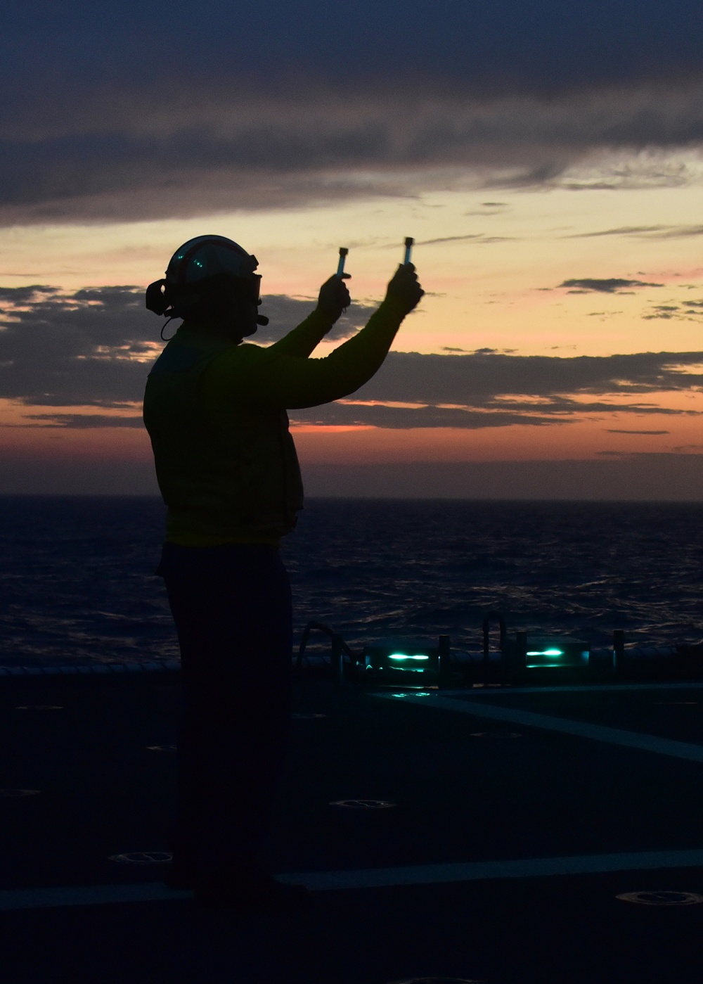CGC Bertholf conducts night flight operations during Western Pacific deployment