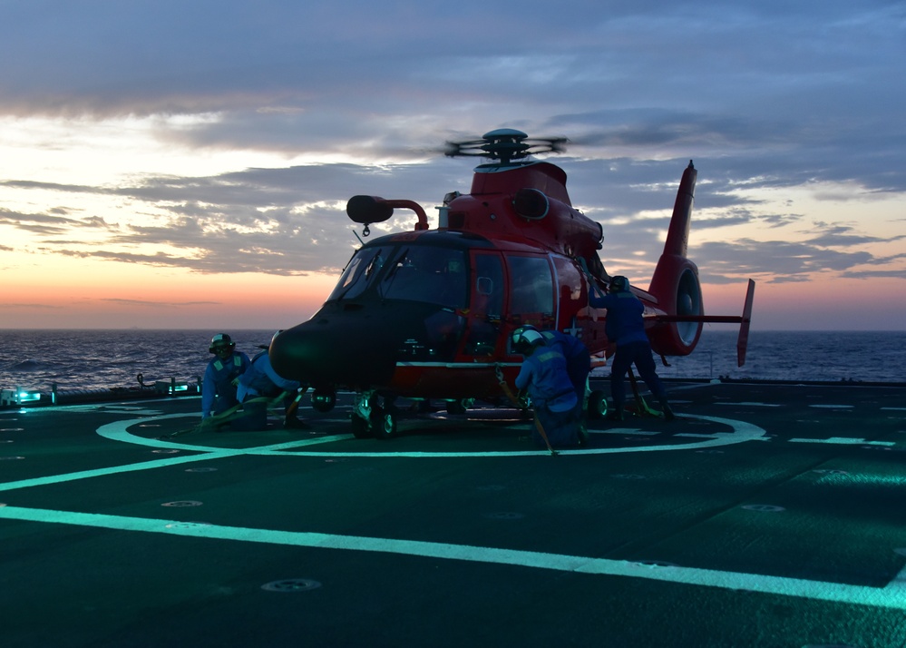 Sunset flight operations aboard CGC Bertholf