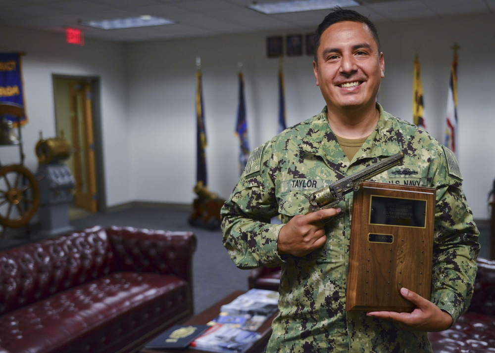 Navy Recruiter Receives 'Six Shooter' Award