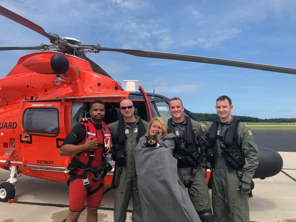 Coast Guard rescues woman, dog from bottom of cliff near Ludington, Mich.