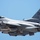 Red Flag 19-3 take offs A U.S. Air Force F-16 Fighting Falcon jet fighter is captured in flight against a clear blue sky. The aircraft bears tail markings 'SW' and serial number 'AF 97 110', indicating it belongs to the 20th Fighter Wing based at Shaw Air Force Base, South Carolina. The aircraft is fully loaded with multiple munitions and external stores on its hardpoints.