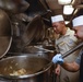 Culinary Specialists prepares a meal aboard Nimitz-class aircraft carrier USS Abraham Lincoln (CVN 72).