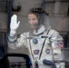 Army astronaut waves goodbye before launch