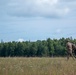 A Czech sniper runs to his next position.