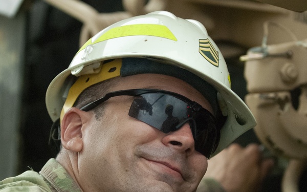 Soldiers dig deep for wheeled vehicle mechanic training