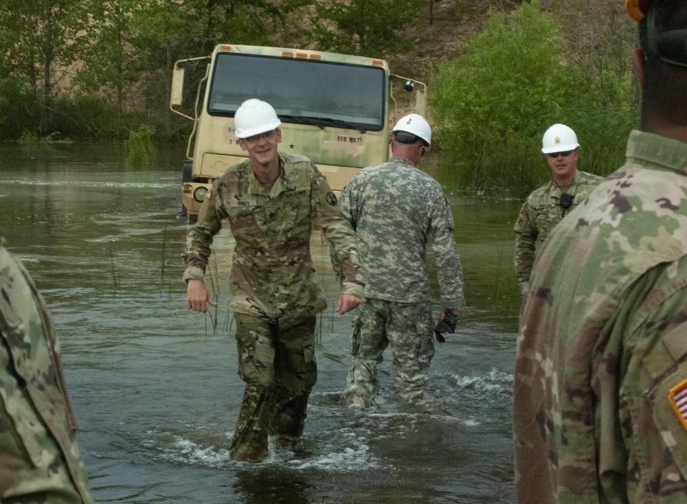 Soldiers dig deep for wheeled vehicle mechanic training