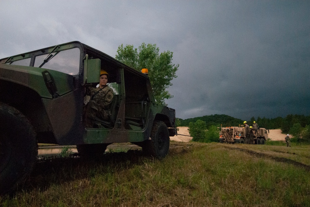 Soldiers dig deep for wheeled vehicle mechanic training