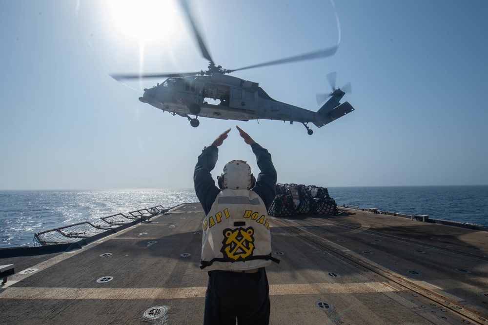 USS Leyte Gulf Conducts a Vertical Replenishment USNS Arctic