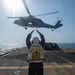 USS Leyte Gulf Conducts a Vertical Replenishment USNS Arctic