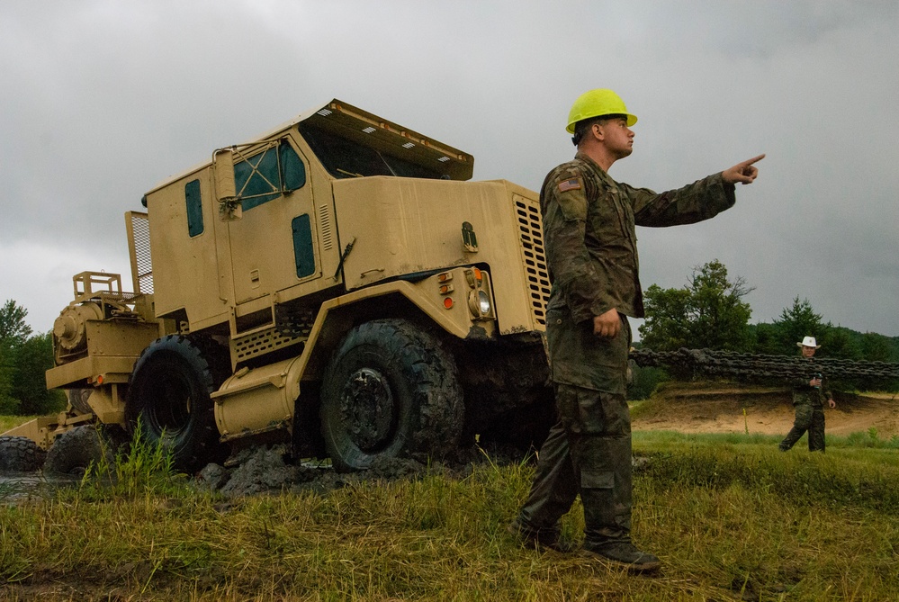 Soldiers dig deep for wheeled vehicle mechanic training