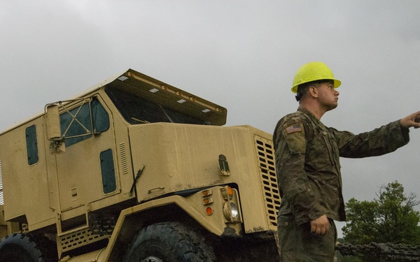 Soldiers dig deep for wheeled vehicle mechanic training