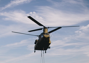 CH-47 Chinook carries a Ground Mobility Vehicle