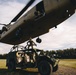 U.S. Army paratroopers sling load a Ground Mobility Vehicle