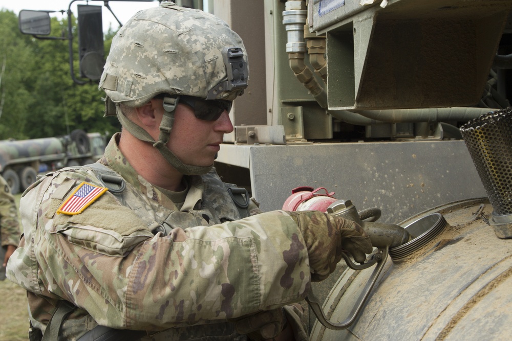 Spc. Michael Radican Refuels Truck