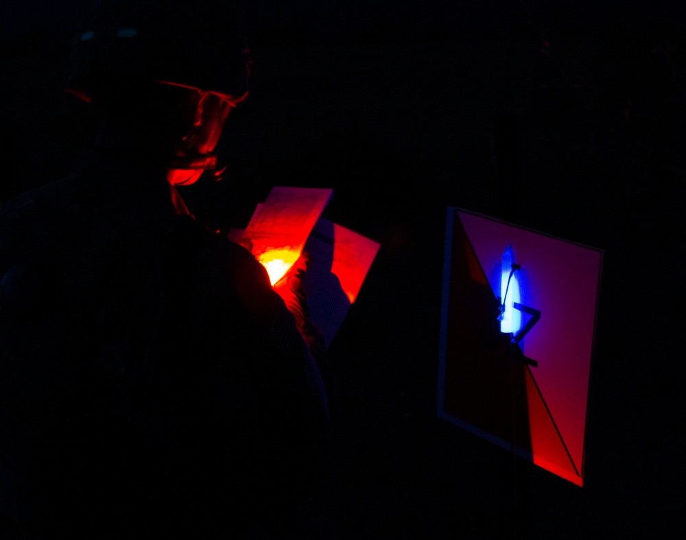 Soldiers conduct night land navigation for EIB