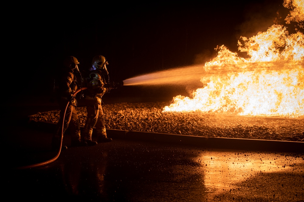 Latvian, Estonian, and Air National Guard firefighters train during Northern Strike 19