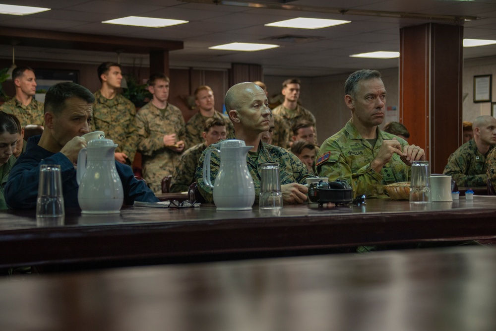 Commanders attend mission brief aboard USS Wasp