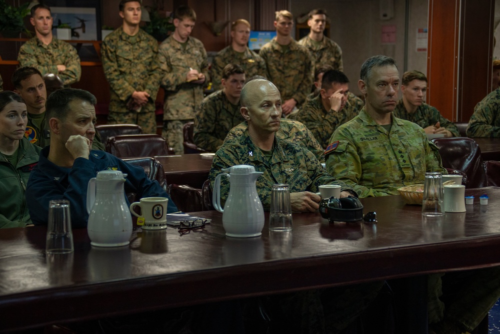 Commanders attend mission brief aboard USS Wasp